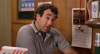 Coach Bobby Finstock (Jay Tarses) shares a stirring anecdote he finds applicable to Scott's uncertain feelings.