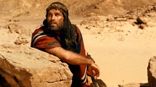 Getting banished to the desert with a single day's food and water supply seems like a death sentence for Moses (Charlton Heston).