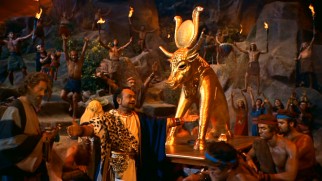 Dathan (Edward G. Robinson) leads the Hebrew people in celebration around a golden calf, at the same time that God is expressly condemning such an act.