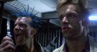 Just 27 years old when they made it, Bill Paxton makes his first of thus far five James Cameron movie appearances, playing the spiky blue-haired, face-tattooed Punk Leader whose gang's clothes are sought by the Terminator.