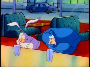 In "Armless But Not Harmless", Arthur and The Tick find a hands-free way to enjoy a drink. The episode is spotlighted in Ben Edlund's new Season Two DVD cover art.