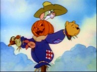 Tigger, Rabbit, Pooh, and Piglet pop out of four spots of a scarecrow in the bonus "New Adventures of Winnie the Pooh" episode "Tigger's Houseguest."