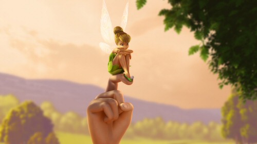 Tink perches down on the fingers of Lizzy, the English girl she befriends in "Tinker Bell and the Great Fairy Rescue."