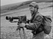 Herb Crisler sets up his video camera to capture the behavior of animal life in the Canadian wilderness.