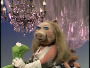 Kermit and Miss Piggy, the Muppets' hot potential couple, make a rare appearance in an installment of the recurring "At the Dance" interstitials.