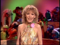 In her colorful finale, Petula Clark performs a song from "Annie" in front of a dozen Muppets.