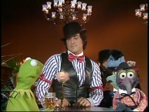 Wearing a top hat, bow tie, and vest, Sylvester Stallone looks dapper amidst the Muppets in his appearance. This was a half-life ago, when making Rocky sequels didn't yield age jokes.