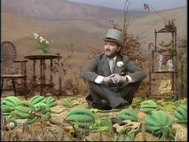 Roger Miller sits the heck out of this watermelon patch.