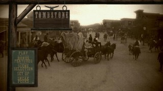 The bustling city of Tombstone, Arizona is displayed in an antiquated filter on the Blu-ray disc's main menu.