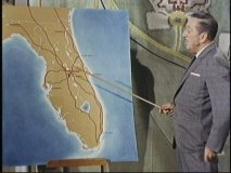 Walt points out the planned location for Disney World