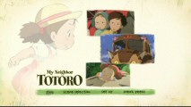 Mei dominates both the background art and the rotating film clips on the main menu for both discs.