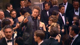 6-foot-9 German director Florian Henckel von Donnersmarck towers over 5'8" Angelina Jolie and everyone else on set in "Bringing Glamour Back."