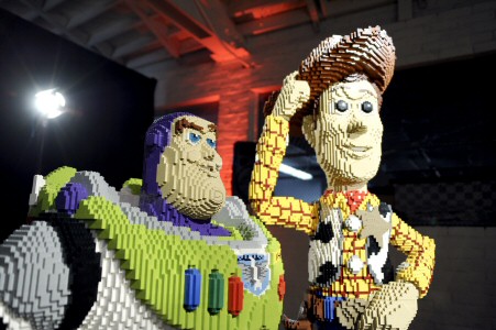 Close-up of the Buzz and Woody statues made from Lego pieces.