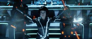 Quorra (Olivia Wilde), who's been like a surrogate daughter to Flynn in his Grid captivity, jumps to action in a nightclub raid.