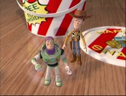 Miniature kids' meal toys Buzz and Woody give Andy's toys only brief pause in an amusing series of "Toy Story Treats", Saturday morning interstitials scattered about Disc 2's menus.