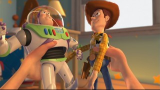 Andy gets his kicks out of playing with the unstoppable duo of Woody and Buzz Lightyear.