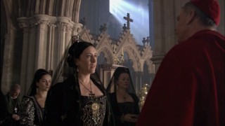 Queen Catherine of Aragon (Maria Doyle Kennedy) and Cardinal Wolsey (Sam Neill) engage in a showdown.