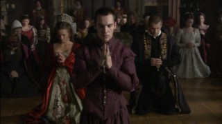 King Henry VIII leads his people in prayer.