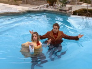 Karsh (Pat Kelly) and the new Ileana (Leslie Seiler) make a crash landing in the pool.