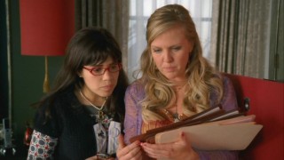 Betty and Christina (Ashley Jensen) rummage through Wilhelminas files in order to find out what she's really up to.