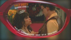 Betty tearfully succumbs to her passion for Henry in her soap opera-inspired dream sequence, seen through her main menu glasses.