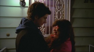 Betty (America Ferrera) and Matt (David Eric Gold) share an intimate moment in front of her house, but it's impossible to have privacy at the Suarez residence for very long.