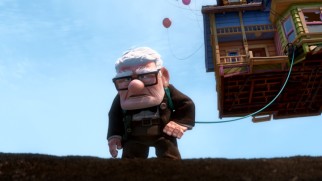 Carl Fredricksen carries his treasured house on his back, with help from a garden hose and a few thousand helium balloons.