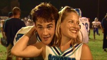 James Van Der Beek sneaks up on Ali Larter while she discusses his fame in 1998 electronic press kit footage used in "Football is a Way of Life."