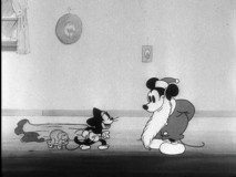"Are you Santy Claus?", asks this mischievous runt in "Mickey's Orphans."
