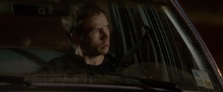 Elliot (Mark Webber) is shocked by all that the KITT-esque anonymous caller knows about him.