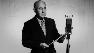 This still of Cecil B. DeMille at a CBS microphone is one of a few that feature onscreen while Lux Radio Theatre's performance of "The 39 Steps" plays.