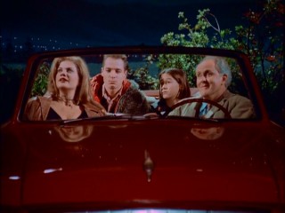 Parked in a popular makeout spot, the Solomons adjust to their new human bodies in the "3rd Rock" pilot episode.