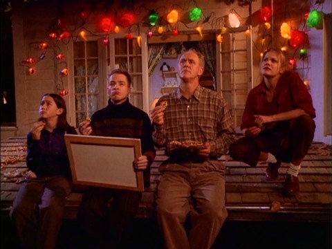 The Solomon Family (Joseph Gordon-Levitt, French Stewart, John Lithgow, and Kristen Johnston) consider Earth's life mysteries from the rooftop outside their third floor apartment.