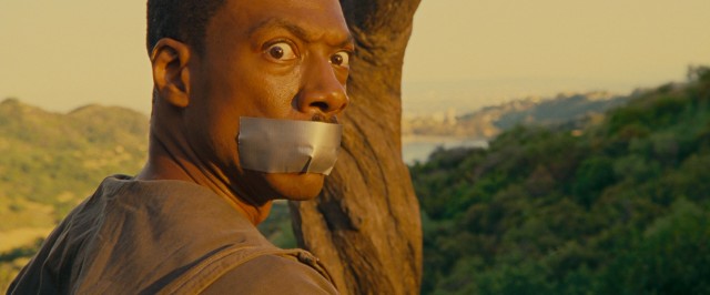 Duct tape over the mouth is one way to limit Jack McCall's (Eddie Murphy) speaking.
