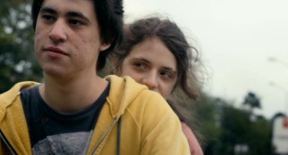 Luca (Mal Chouza) holds on to Santiago (Pedro Duarte) for a short bike ride.