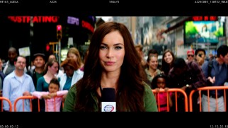 April O'Neil (Megan Fox) does some non-frothy reporting in the brief extended ending.