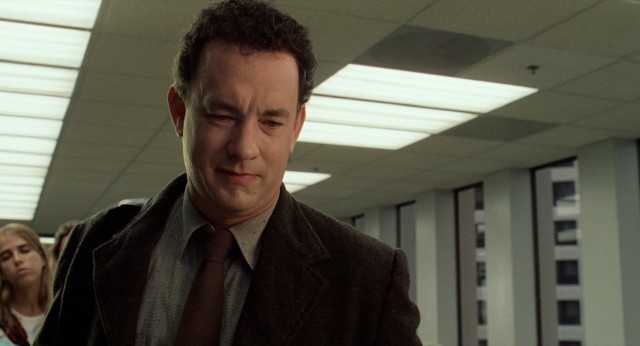 Viktor Navorski (Tom Hanks) approaches the customs counter as usual, but this time confident he'll get that elusive approved stamp.
