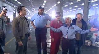 The late, great Kumar Pallana gives a little speech in front of his castmates and director.