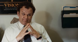 John C. Reilly plays sympathetic assistant principal Mr. Fitz(gerald), who listens in front of a motivational poster.