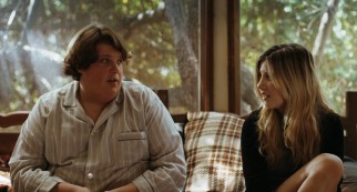 Pajama-wearing mess Terri (Jacob Wysocki) somehow attracts the attentions of pretty classmate Heather Miles (Olivia Crocicchia).