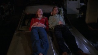 Donna (Laura Prepon) and Eric (Topher Grace) share a memorable moment on the hood of the Vista Cruiser in the pilot episode.
