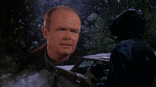 Red (Kurtwood Smith) appears to Eric as a vision in the snow of the gang's ski trip.