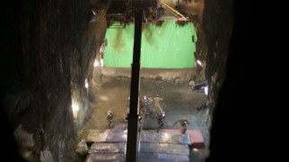 Behind-the-scenes footage shows how "The Mine Collapse" was recreated with rigs, green screen, and gym mats.