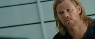 Stripped of his armor and some of his power, Thor (Chris Hemsworth) is questioned by S.H.I.E.L.D. Agent Phil Coulson.