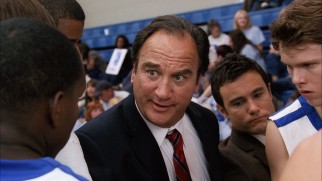 Jim Belushi is uncharacteristically entertaining in the role of Coach Zitowski, with his son Robert playing his assistant as a double act.