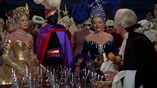 Mother (Jessie Royce Landis) and daughter (Grace Kelly) attend a costume ball in the company of a Moor.
