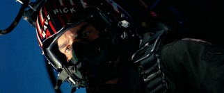 So much of the movie looks like this: an obscured view of a pilot in flight (in this case, a barely recognizable Tom Cruise).