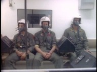 Three actors get acquainted with Navy pilot oxygen masks in this survival training featurette.