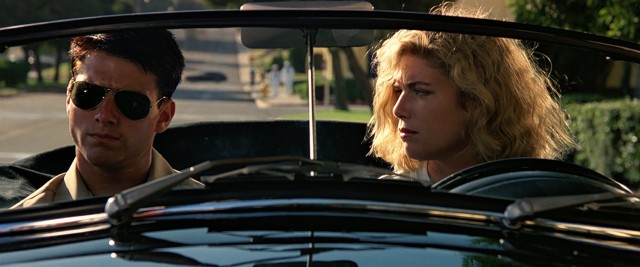 Maverick (Tom Cruise) finds that Charlie (Kelly McGillis) takes his breath away. He later learns she's his teacher.