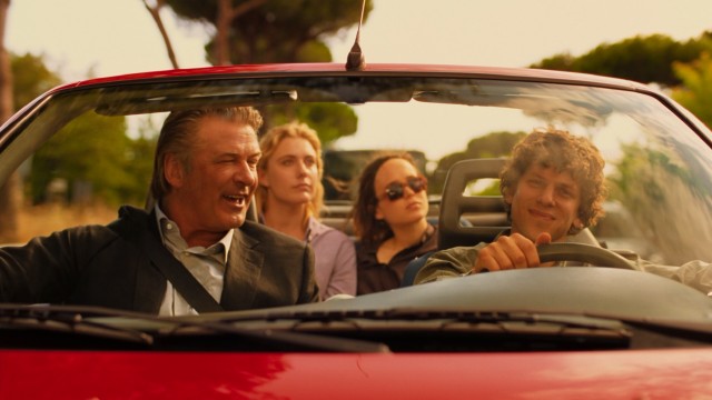 John (Alec Baldwin) continues to share his surreal wisdom with Jack (Jesse Eisenberg) as they take a picturesque drive around Rome.